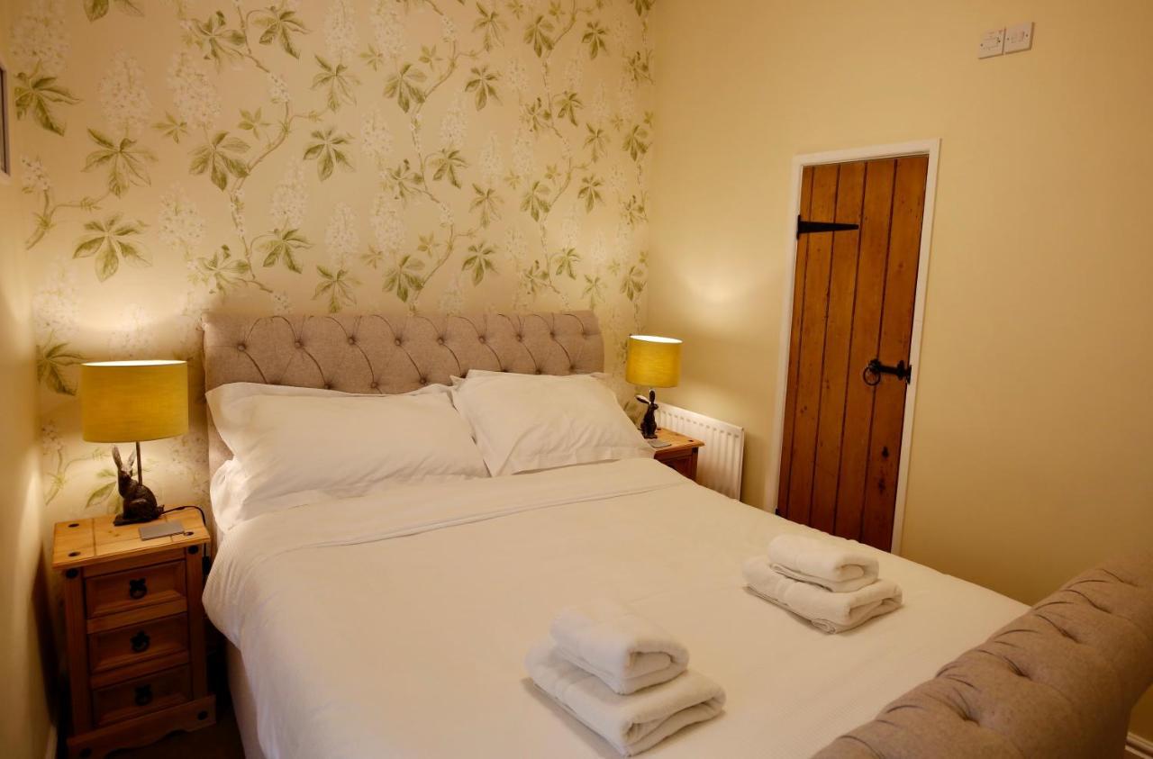Ashfield House Hotel Грасингтън Стая снимка A bedroom at the Old Post Office